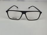 a pair of glasses on a white surface with a white background