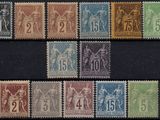 a close up of a group of stamps on a black surface