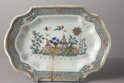 a plate with a picture of a castle on it