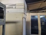 a refrigerator and a freezer in a room with a window