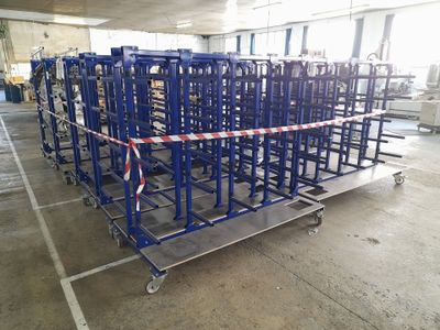 a large metal rack with a bunch of items on top of it