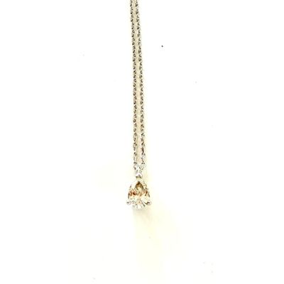 a close up of a diamond necklace on a white background