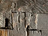 a close up of a piece of wood that has been burnt