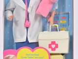Poupée Barbie « Docteur » avec une petite poupée dans un coffret rose