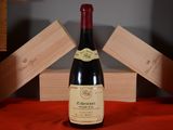 a bottle of wine that is sitting on a table