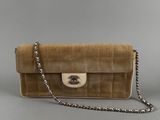 chanel, a beige sued shoulder bag