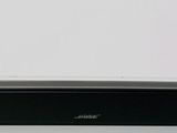 a remote sitting on top of a black box