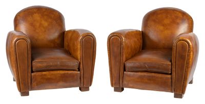 pair of leather club chairs with arms and legs