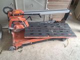 a machine that is sitting on the ground with it ' s wheels