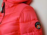 the jacket is bright pink and has a hood on it