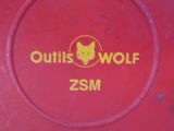 a red frisbee with the words outie wolf on it