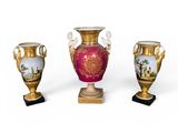 three vases sitting on top of a wooden stand next to each other