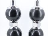 pair of black and chrome table lamps with glass globe shades