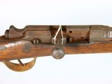 an old rifle with a wooden handle on a white background