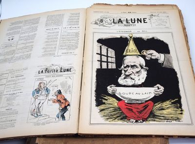 un vieux livre sur lequel figure le dessin d'un homme en train de manger un bol de soupe
