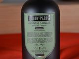 a bottle of wine that is sitting on a table
