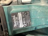 a close up of a power tool that is sitting on a table