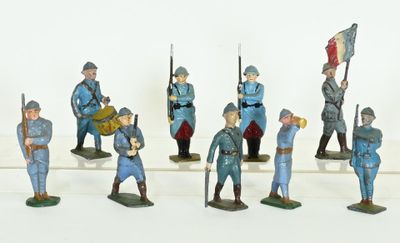 many figurines of men in blue uniforms on display
