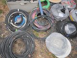 many different types of hoses and hoses on the ground