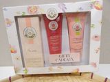 two tubes of hand creams in a white box