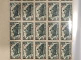 an old picture of a sheet of stamps with a picture of a cat