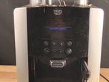 a coffee machine that is sitting on a wooden table