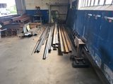 many pieces of wood that are stacked up in a warehouse