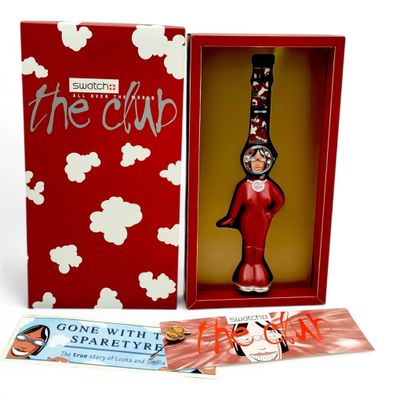 the cup is in a red box with a picture of a woman holding a wine glass