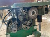 a machine that is sitting on a table with gears on it