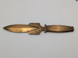 an image of a knife that is sitting on top of a table