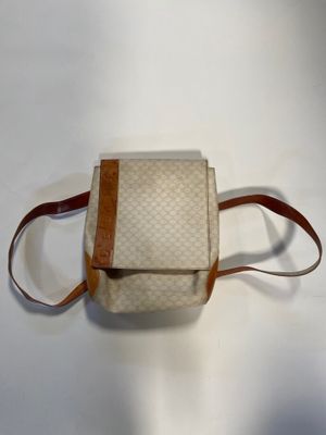 an image of a purse on a white surface
