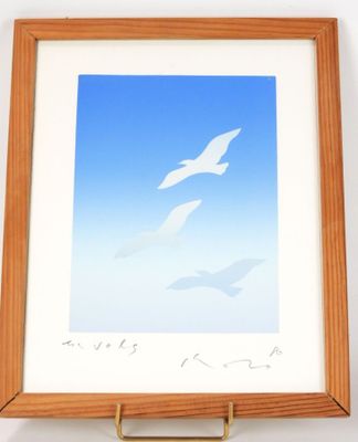 a picture of a picture of two birds flying in the sky