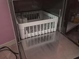a dishwasher with a basket inside of it in a kitchen
