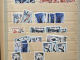 a refrigerator with a lot of different stamps on it