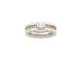 a close up of a diamond ring on a white background