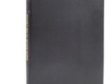 a black leather book with gold lettering on the cover