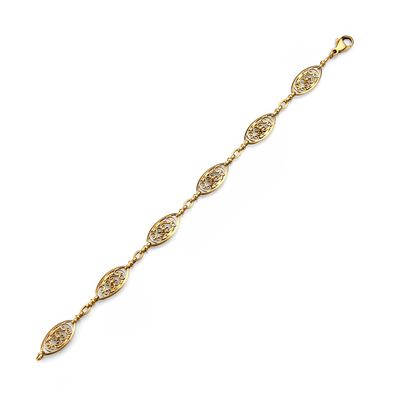 a yellow gold bracelet with an intricate design