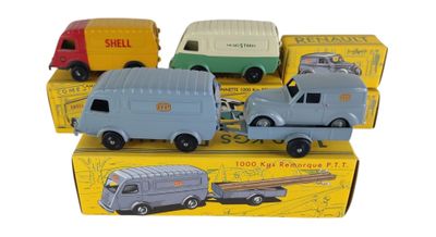 quatre camions miniatures rangés dans une boîte
