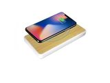 an image of a wireless charger with a cell phone on top of it