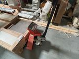 a lot of boxes and tools on the floor in a room