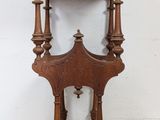 an old wooden table with a drawer on top of it