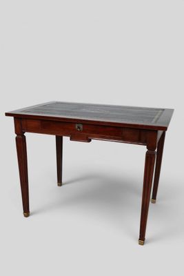 an image of a small table with a drawer underneath it
