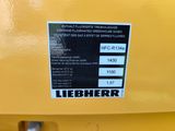 a label on the back of a yellow machine