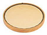 an image of a wooden drum with a black band