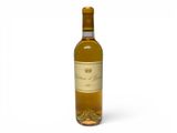 a bottle of wine that is sitting on a table
