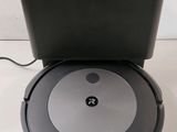an image of a robotic vacuum cleaner sitting on top of a table