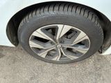 a close up of a tire on a car ' s rim