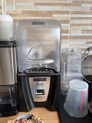 a blender and a blender sitting on a kitchen counter