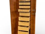 une grande armoire en bois comportant de nombreux tiroirs