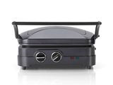 an image of a black and silver grill on a white surface